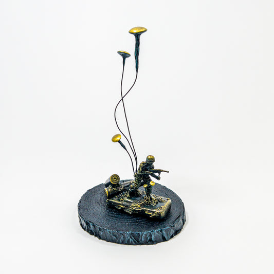 Vintage green army man overtaken by towering fungi